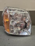 07-14 Gmc Yukon Passenger Side Front Right Headlight Assembly. Fixed Price $150.00.