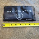 Cadillac Headlamp Service Tool & Plastic Pouch 1634123. Fixed Price $13.95.