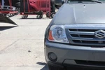 Passenger Right Headlight XL-7 Fits 04-06 Vitara 572465. Fixed Price $130.00.