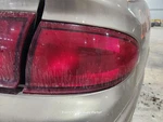 Passenger Right Tail Light Quarter Panel Mounted Fits 97-04 Regal 1349132. Fixed Price $45.00.