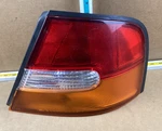 1998-1999 Nissan Altima Right Tail Light Assembly Oem. Fixed Price $48.99.