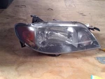 Passenger Headlight Sedan Shaded Background Fits 01-03 Mazda Protege 236561. Fixed Price $64.99.