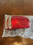 Tail Light Assembly-regular Left Tyc 11-5026-01 Fits 97-04 Dodge Dakota. Fixed Price $25.00.