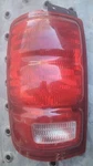 97-02 Ford Expedition Driver Tail Light Without Metallic Coated Body. Fixed Price $33.99.