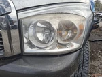 2007 Dodge Truck TDODR1500 Driver Left Headlight Assembly - Used, Fade 4DR. Fixed Price $100.70.