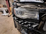 2014-2015 Jeep Grand Cherokee Summit Passenger Headlight Cracked Repair. Fixed Price $724.38.