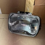Driver Left Headlight Fits 84-96 Jeep Cherokee Replacement Nib. Fixed Price $29.99.