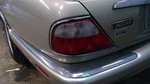 Driver Left Tail Light Chrome Bezel Fits 98-03 XJ8 12019. Fixed Price $94.00.