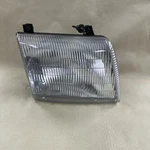 Passenger Right Headlight Fits 98-03 Dodge 1500 Van 621391. Fixed Price $50.00.
