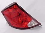 New Oem Tail Lamp Assembly Driver Side 2003-07 Saturn Ion Sedan Door 22723024. Fixed Price $70.00.