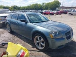 Passenger Right Headlight Dark Background Fits 05-07 Magnum 440140. Fixed Price $76.00.