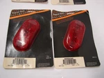 Two New Old Stock Signal-stat Red Lens #77-556 / 9093D Oval, 2" X 4". Fixed Price $14.95.
