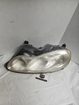Driver Left Headlight Fits 02-04 Concorde 373701. Fixed Price $50.00.