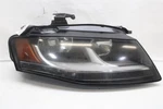 Headlight Lamp Assembly Audi A4 09 10 11 12 Right 1453497. Fixed Price $109.99.