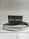 Passenger Right Headlight Chrome Bezel Fits 11-14 200 373760. Fixed Price $60.00.