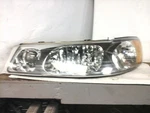 Driver Left Headlight Fits 01-02 Lincoln & Town Car 1982625. Fixed Price $75.00.
