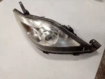Passenger Headlight Xenon Hid Black Trim Fits 08-10 Mazda 355331. Fixed Price $250.00.