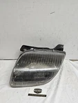 Driver Left Headlight Fits 95-02 Sunfire 57304. Fixed Price $50.00.