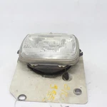 1993 Dodge B250 Right Hand Headlamp Part Number 114-00319BR. Fixed Price $74.99.