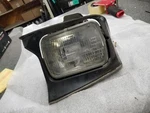 Passenger Right Headlight Fits 89-92 Probe 200162. Fixed Price $102.00.