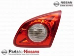 Genuine Nissan Back Up Light Assembly 26550-JM01C. Fixed Price $87.92.
