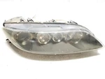 06 07 08, Mazda Sw, Right Headlight Xenon Hid Tinted Lens, GP7C51031C, Oem. Fixed Price $675.00.