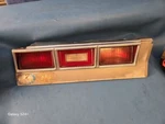 79 Chevy Passenger Left Tail Light With Filler Panel 1357. Fixed Price $74.85.