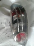 Passenger Tail Light Silver With Red Lens Surround Fits 04-08 Mazda RX8 762835. Fixed Price $125.98.