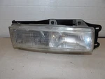 Eagle Summit 1989-1990 Rh Passenger Side Headlight Assembly With Mount Bracket. Fixed Price $70.50.