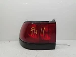 Driver Left Tail Light Sedan Quarter Panel Mounted Fits 94-96 Escort 197311. Fixed Price $71.99.