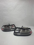 2003-2011 Saab 9-3 Ice Block Clear Tail Light Lamp Set Sedan Only Genuine Oem. Fixed Price $295.00.