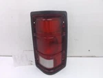 Passenger Tail Light Thru 11/27/87 Black Bezel Fits 87-88 Dakota 128345. Fixed Price $62.69.