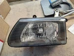 Driver Headlight Door Sport Package Fits 01-02 Isuzu Rodeo 80252. Fixed Price $67.50.