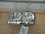 Driver Left Headlight Halogen Without Projector Fits 05-07 300 311342. Fixed Price $28.75.