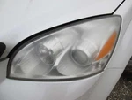 (small Stress Marks Lens) Driver Headlight Halogen Low Beam 08-10 Outlook 353193. Fixed Price $75.00.
