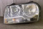 # 2005-2006-2007 Chrysler 300 Lh Driver Side Headlight Touring Halogen Oem. Fixed Price $89.99.