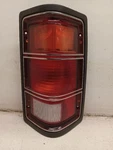 Passenger Tail Light Thru 11/27/87 Black Bezel Fits 87-88 Dakota 1077940. Fixed Price $80.00.