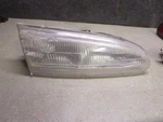 1995-97 Ford Countour Passenger Right Side Headlight. Fixed Price $64.98.