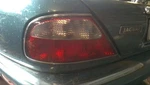 Driver Left Tail Light Chrome Bezel Fits 98-03 XJ8 31681284. Fixed Price $110.70.