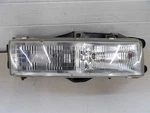 Eagle Summit 1989-1990 Rh Passenger Side Headlight Assembly With Mount Bracket. Fixed Price $70.50.
