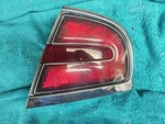 1998-04 Buick Park Ave Passenger Right Tail Light Quarter Mount. Fixed Price $40.00.