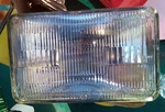 New General Electric High/low Sealed Beam Headlight Bulb 4921. Fixed Price $14.25.