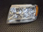 Driver Headlight Crystal Clear Fits 99-04 Grand Cherokee 2162166. Fixed Price $82.00.