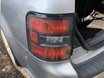 Driver Left Tail Light With Led Black Border Trim Oem 11 Flex 1389955. Fixed Price $193.50.