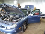 Passenger Right Headlight Fits 99 Taurus 2094121. Fixed Price $80.00.