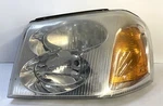 2002-09 Gmc Envoy Lh Driver Side Headlight Oem 114-00688L. Fixed Price $70.00.