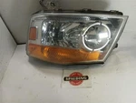 Driver Left Headlight From Nissan Armada 9878251. Fixed Price $214.94.
