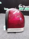 Passenger Right Tail Light Ends Fits 94-97 Lhs 1944557. Fixed Price $82.00.
