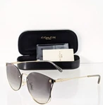 Brand New Authentic Coach Sunglasses Hc 7151 900511 Shiny Light Gold 63MM. Fixed Price $114.99.