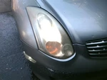 Passenger Headlight Xenon Hid Door Coupe Fits 06-07 Infiniti G35 824943. Fixed Price $250.00.
